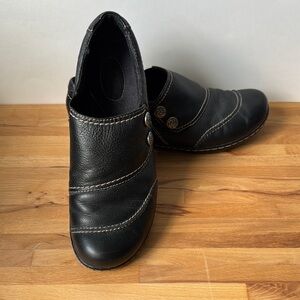 Clarks Black Leather Flats with Slip-On Design